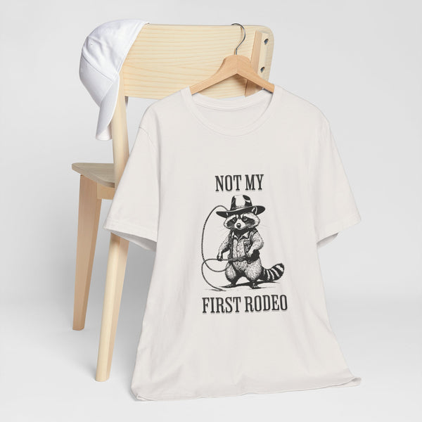 Not My First Rodeo Cowboy Raccoon Shirt, Funny Western Graphic Cotton Tee, Cute Quirky Country Style T-Shirt for Rodeo Fans & Animal Lovers